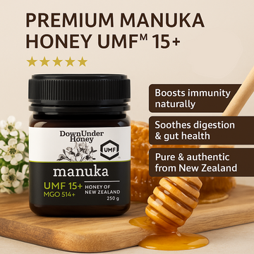 Manuka honey jar with honeycomb and flowers on a wooden board, featuring UMF certification.